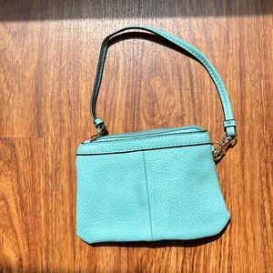 A Wilson’s leather blue handbag